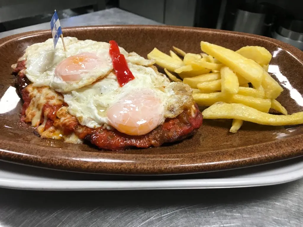 Milanesa A La  Napolitana A Caballo